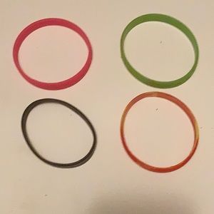 Lot of 4 rubber bracelets